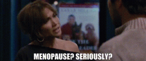 A Woman Talking To A Man With The Words Menopause Seriously GIF