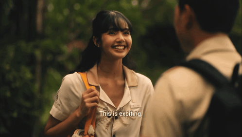 a woman talking to a man with the words " this is exciting "