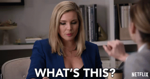 a woman talking to another woman with the words " what 's this " on the bottom