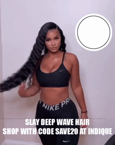 A Woman Wearing A Black Nike Pro Bra And Pants GIF