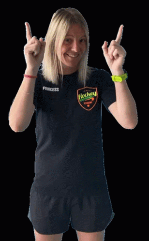 A Woman Wearing A Black Princess Hockey Shirt GIF