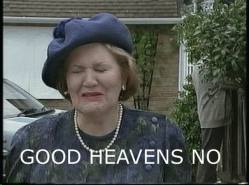 A Woman Wearing A Blue Hat And Pearls Says " Good Heavens No " GIF