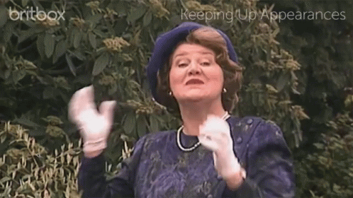 A Woman Wearing A Blue Hat And White Gloves With The Words Keeping Up Appearances On The Bottom GIF