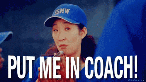 A Woman Wearing A Blue Hat Says Put Me In Coach . GIF