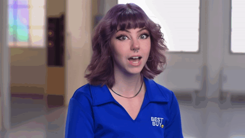 A Woman Wearing A Blue Shirt That Says Best Buy On It GIF