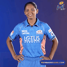 A Woman Wearing A Blue Shirt That Says Lotus On It GIF