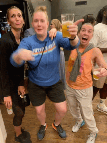 A Woman Wearing A Blue Sweatshirt That Says Duty Of Fame GIF