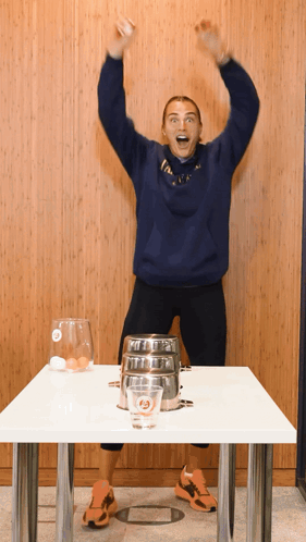 A Woman Wearing A Blue Sweatshirt That Says ' I Love Ny ' On It GIF