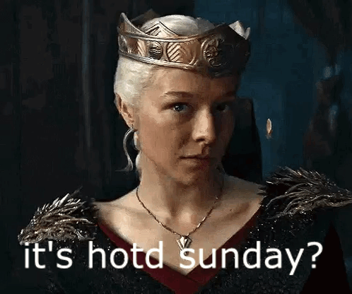 A Woman Wearing A Crown And A Necklace Is Saying `` It 'S Hot Sunday ? '' . GIF