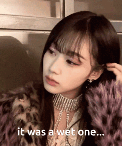 A Woman Wearing A Fur Coat And A Choker Says " It Was A Wet One ... " GIF