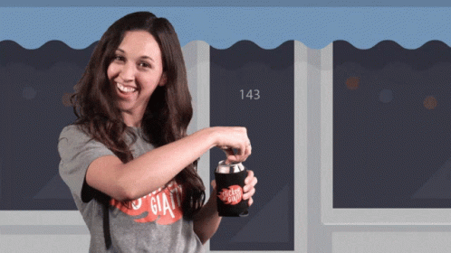 A Woman Wearing A Gray Shirt That Says Gia GIF