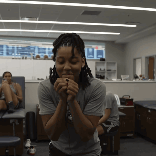 Woman Wearing NC State Shirt GIF