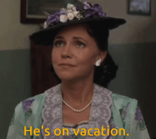 A Woman Wearing A Hat And A Pearl Necklace Says " He 'S On Vacation " GIF