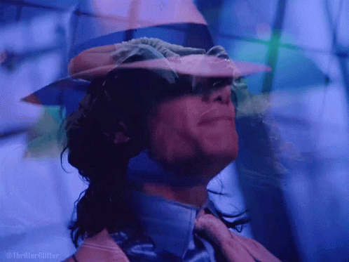 Woman With Hat And Sunglasses Thriller Glitter GIF