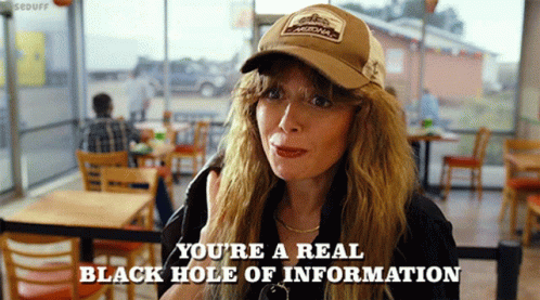 A Woman Wearing A Hat Says " You 'Re A Real Black Hole Of Information " In A Restaurant GIF