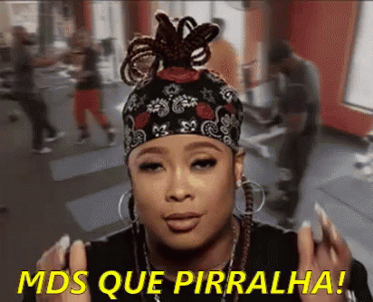 A Woman Wearing A Headband And Earrings Says Mds Que Pirralha . GIF