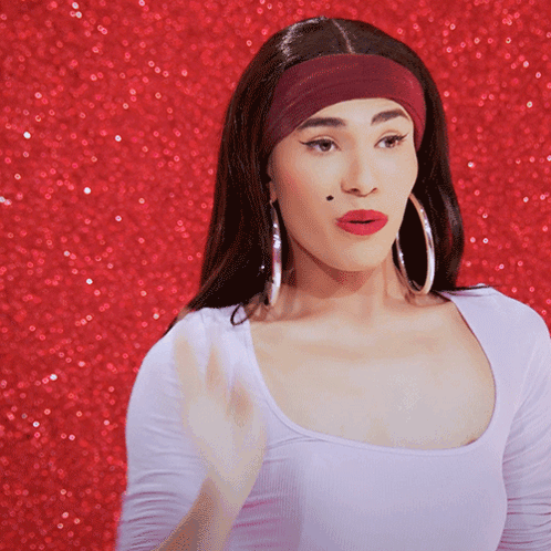 Surprised Woman Wearing Headband And Hoop Earrings GIF