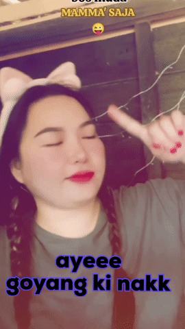 A Woman Wearing A Headband That Says Mamma 'Saja On It GIF