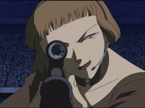 a woman wearing a headset is holding a gun in her hand