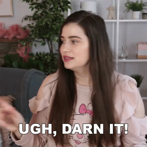 A Woman Wearing A Hello Kitty Shirt Says " Ugh Darn It " GIF