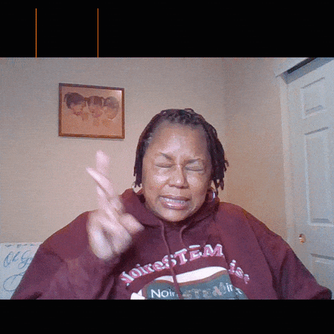 A Woman Wearing A Hoodie That Says " Noirestem " On It GIF