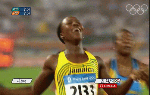 A Woman Wearing A Jamaica Jersey With The Number 2133 On It GIF