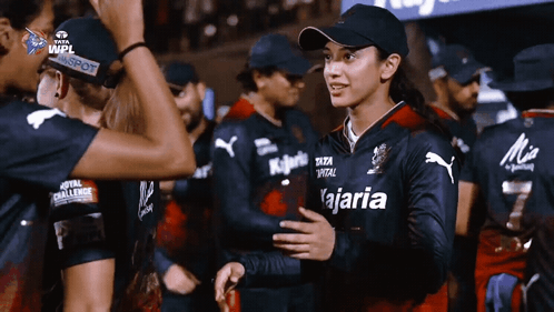 A Woman Wearing A Jersey That Says " Kajaria " On It GIF