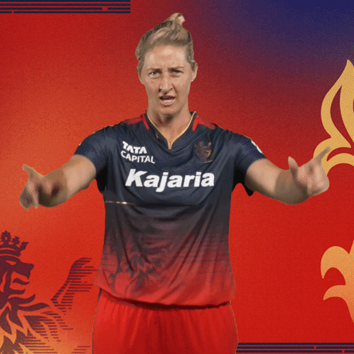 A Woman Wearing A Jersey That Says Raja La On It GIF