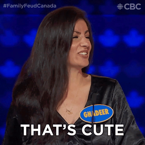 A Woman Wearing A Name Tag That Says Ghader GIF