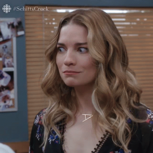 Woman Wearing Necklace With A GIF