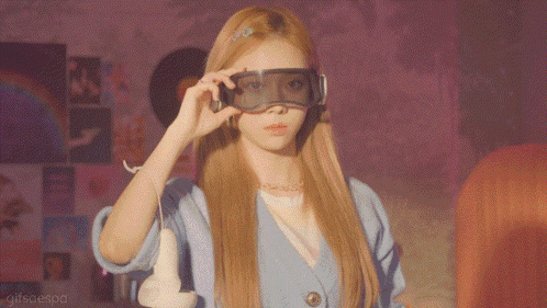 a woman wearing a pair of virtual reality goggles with gifsaesoa written on the bottom right