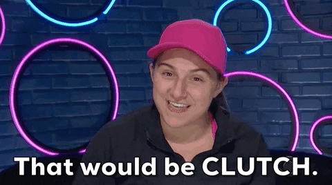A Woman Wearing A Pink Hat And A Black Jacket Is Making A Funny Face And Saying That Would Be Clutch . GIF