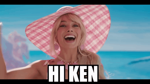 A Woman Wearing A Pink Hat With The Word Hi Ken On The Bottom GIF
