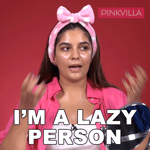 A Woman Wearing A Pink Headband And A Pink Shirt Says " I 'M A Lazy Person " GIF