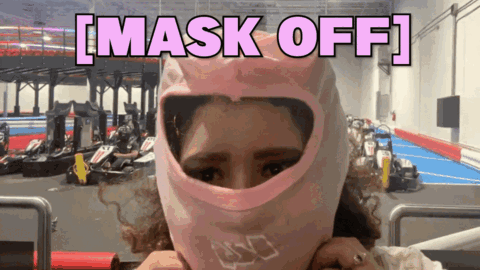 A Woman Wearing A Pink Helmet With The Words Mask Off On The Bottom GIF
