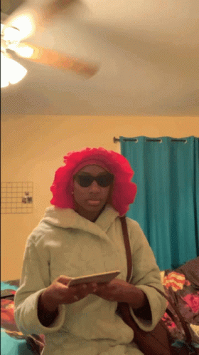 Woman With Pink Wig And Sunglasses Holding Phone GIF