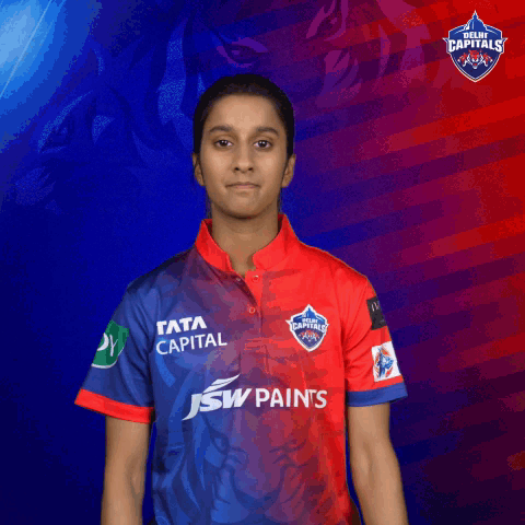 A Woman Wearing A Red And Blue Shirt That Says J & W Paints GIF