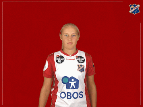 a woman wearing a red and white jersey that says obos on it