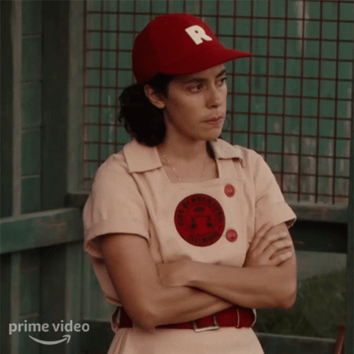 Woman In Red Hat With R Standing Crossed Arms GIF