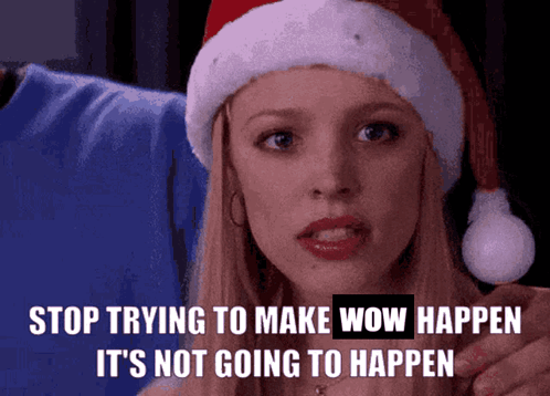 A Woman Wearing A Santa Hat Says Stop Trying To Make Wow Happen GIF