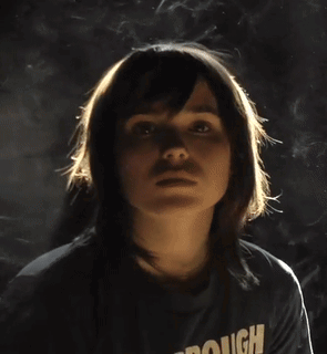 A Woman Wearing A Scarborough Police T-Shirt Smiles GIF