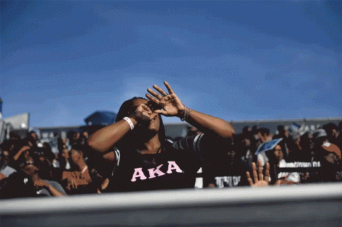 A Woman Wearing A Shirt That Says Aka Covering Her Eyes GIF