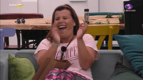 A Woman Wearing A Shirt That Says Carpe Is Laughing GIF