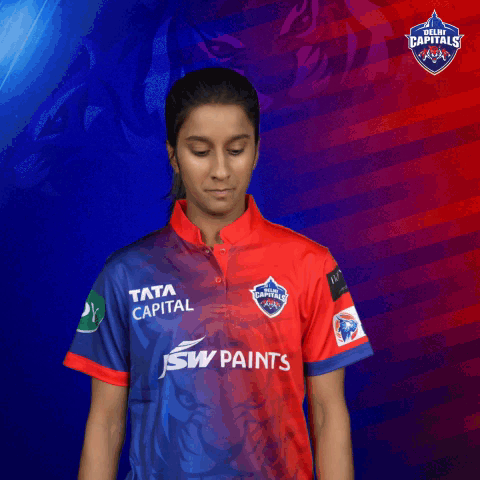 A Woman Wearing A Shirt That Says Tata Capital GIF