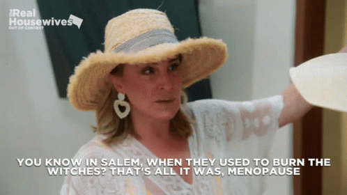 A Woman Wearing A Straw Hat Says " You Know In Salem , When They Used To Burn The Witches " GIF