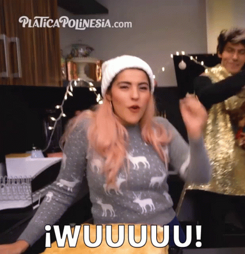 A Woman Wearing A Sweater With Deer On It And A White Hat Says Iwuuuuuu GIF