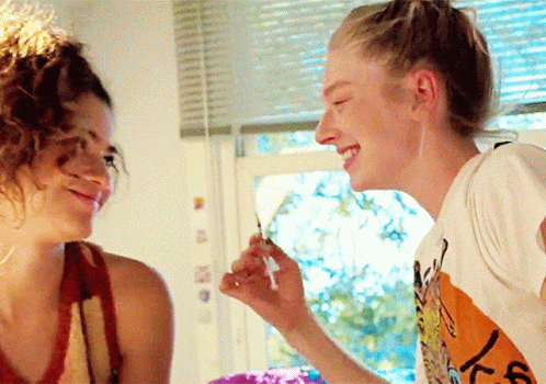 A Woman Wearing A T-Shirt That Says ' I Love You ' On It Smiles At Another Woman GIF