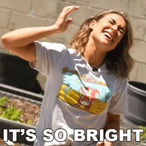 A Woman Wearing A T-Shirt That Says ' It 'S So Bright ' GIF