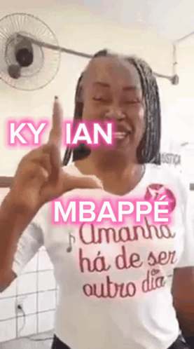 A Woman Wearing A T-Shirt That Says Mbappe On It GIF