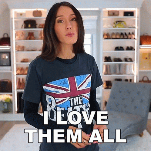 A Woman Wearing A T-Shirt That Says The Beatles I Love Them All GIF